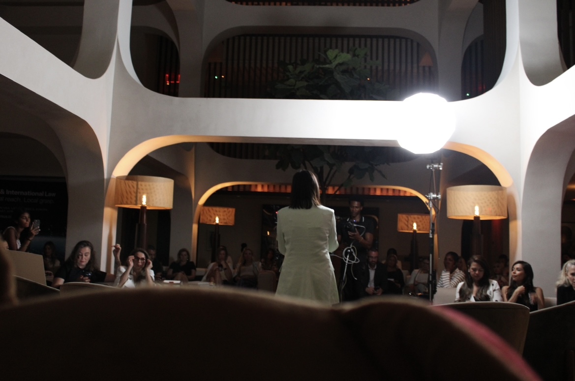 Seema Alexander speaking at venue